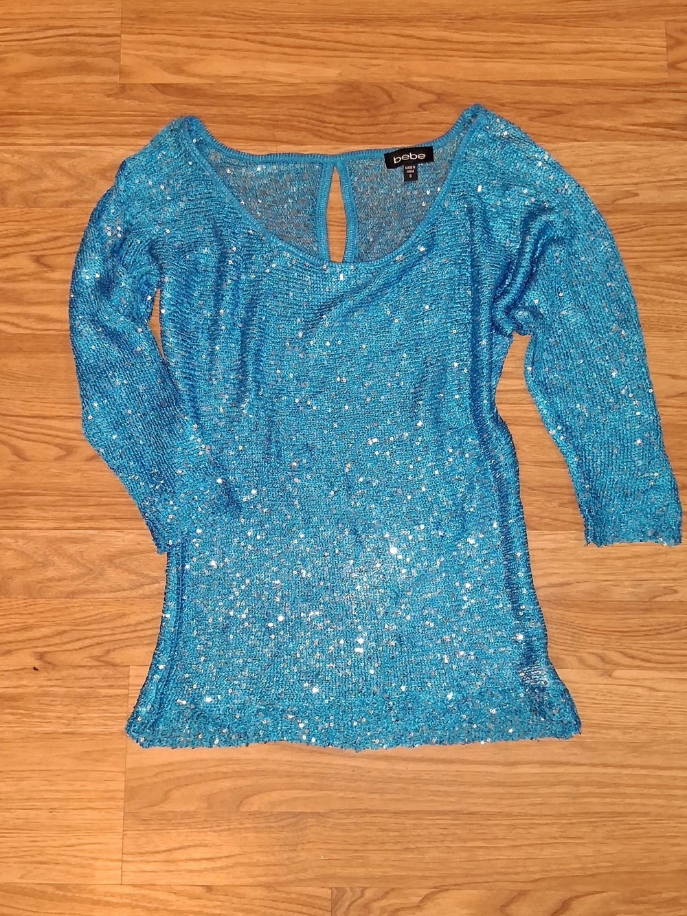Bebe Turquoise Top with Cut-Out Shoulders & All Over Sequin Glitter